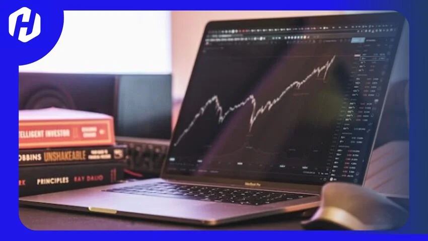 laptop trader sedang melakukan cara menganalisa saham bagi pemula