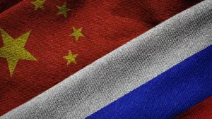 bendera rusia dan china yang sepakat untuk dedolarisasi