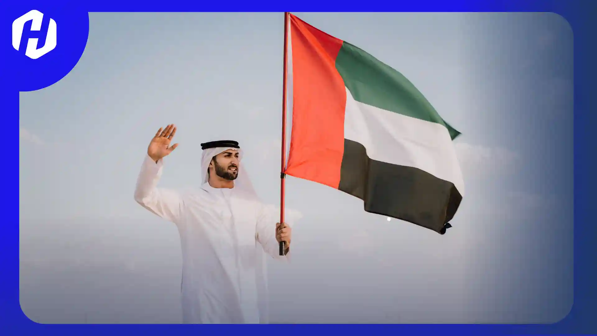 seseorang mengibarkan bendera uni emirat arab