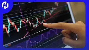 seseorang sedang menjalankan tips trading dengan timeframe 15 menit